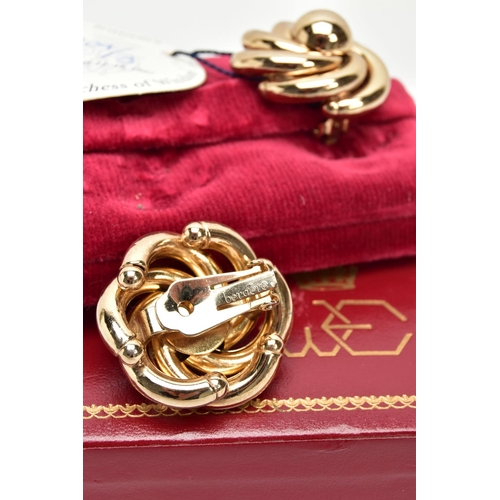 136 - DUKE & DUCHESS OF WINDSOR INTEREST, a pair of Bergere gold plated clip on earrings of open swirl des... 