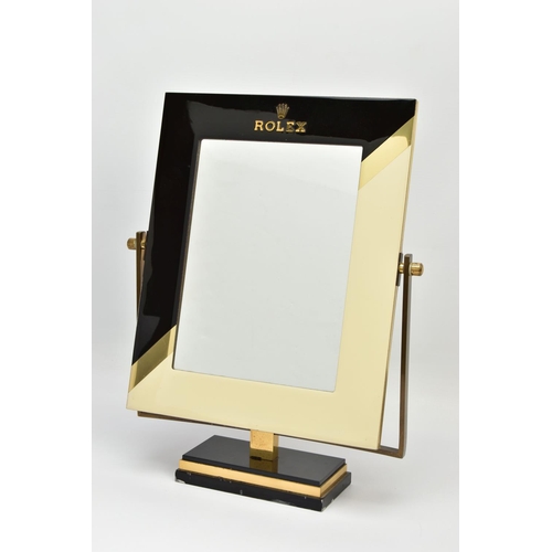 139 - A ROLEX RETAILER'S COUNTER TOP MIRROR, the rectangular swing mirror with black and cream lacquered s... 