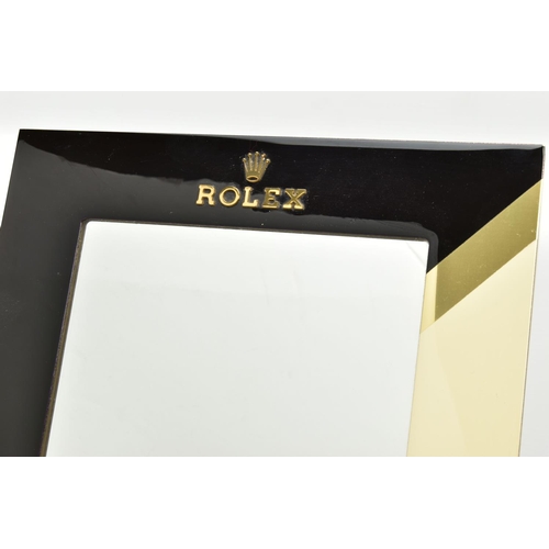 139 - A ROLEX RETAILER'S COUNTER TOP MIRROR, the rectangular swing mirror with black and cream lacquered s... 