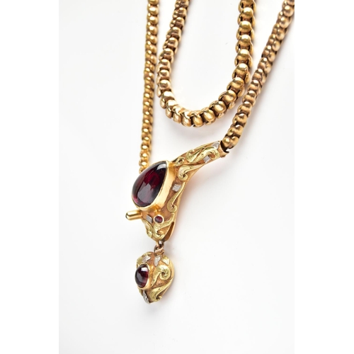 14 - A VICTORIAN GARNET SET GOLD SNAKE NECKLACE, the serpent's head set with a pear shape garnet cabochon... 