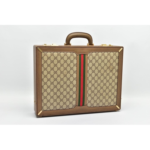 140 - A VINTAGE GUCCI BRIEFCASE WITH GREEN LEATHER TRIM, the front and back vinyl panels with Gucci logos ... 