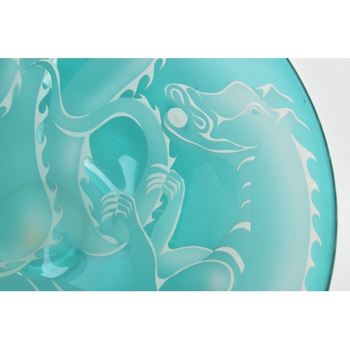 153 - JULIA LINSTEAD (BRITISH CONTEMPORARY) A GREEN OVERLAY GLASS BOWL WITH DRAGON DECORATION, signed to t... 