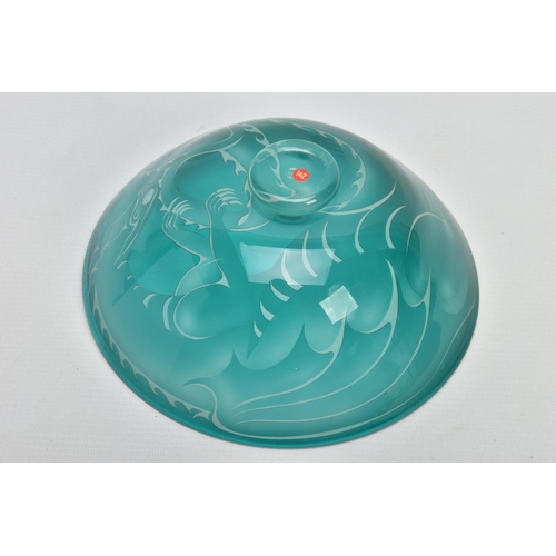 153 - JULIA LINSTEAD (BRITISH CONTEMPORARY) A GREEN OVERLAY GLASS BOWL WITH DRAGON DECORATION, signed to t... 