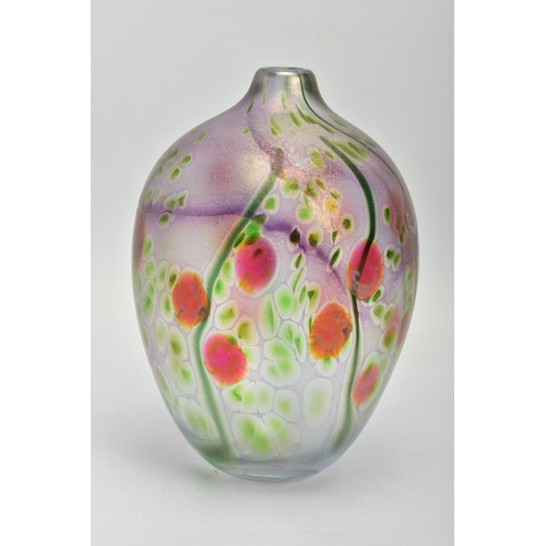 162 - PETER LAYTON (BRITISH 1937) AN IRIDESCENT OVOID SHAPED GLASS VASE, decorated with berries and foliag... 