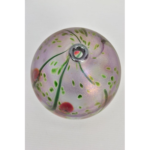 162 - PETER LAYTON (BRITISH 1937) AN IRIDESCENT OVOID SHAPED GLASS VASE, decorated with berries and foliag... 