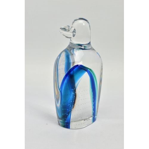 177 - GORAN WARFF FOR KOSTA BODA, a glass penguin paperweight having a green and blue internal stripe and ... 