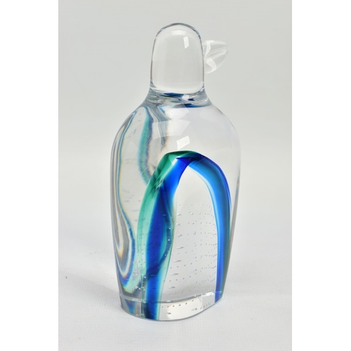 177 - GORAN WARFF FOR KOSTA BODA, a glass penguin paperweight having a green and blue internal stripe and ... 