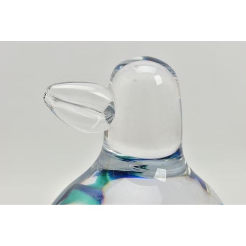 177 - GORAN WARFF FOR KOSTA BODA, a glass penguin paperweight having a green and blue internal stripe and ... 