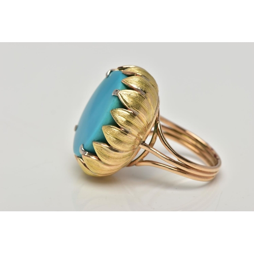 19 - A MID 20TH CENTURY TURQUOISE YELLOW METAL COCKTAIL RING, set with a principal oval flat polished top... 