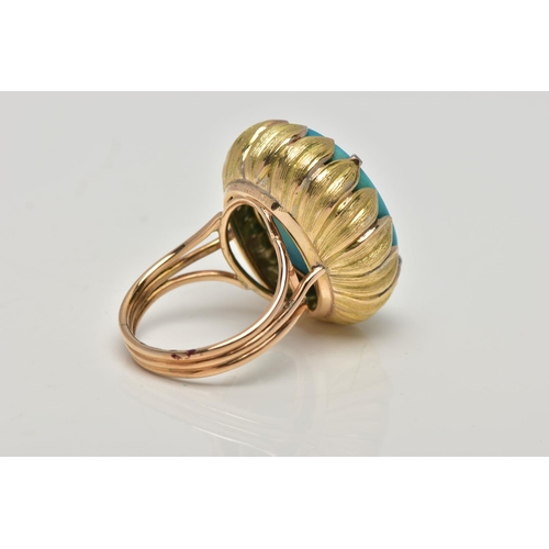 19 - A MID 20TH CENTURY TURQUOISE YELLOW METAL COCKTAIL RING, set with a principal oval flat polished top... 