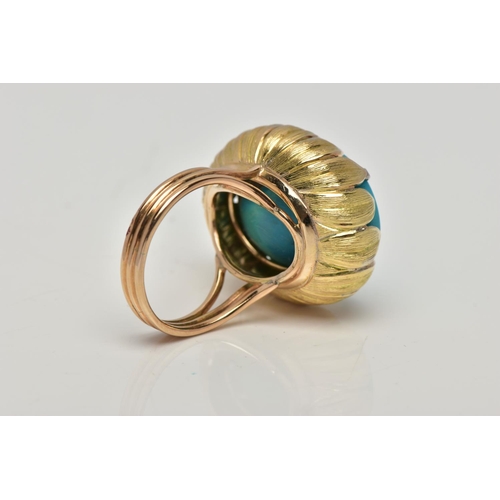 19 - A MID 20TH CENTURY TURQUOISE YELLOW METAL COCKTAIL RING, set with a principal oval flat polished top... 