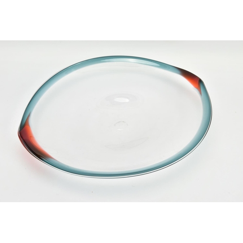 198 - NEIL WILKIN (BRITISH 20TH CENTURY) A LARGE SHALLOW GLASS BOWL, having a clear body and coloured rim,... 