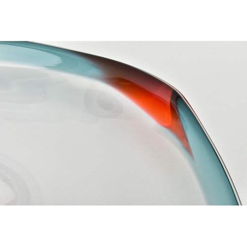 198 - NEIL WILKIN (BRITISH 20TH CENTURY) A LARGE SHALLOW GLASS BOWL, having a clear body and coloured rim,... 