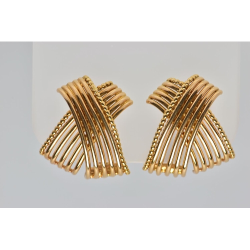 20 - A PAIR OF MID 20TH CENTURY CARTIER EARRINGS CIRCA 1960s, each ear clip designed as a wirework crosso... 