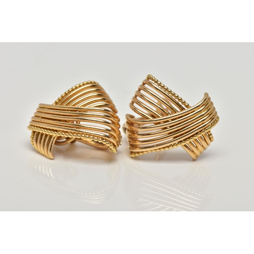 20 - A PAIR OF MID 20TH CENTURY CARTIER EARRINGS CIRCA 1960s, each ear clip designed as a wirework crosso... 