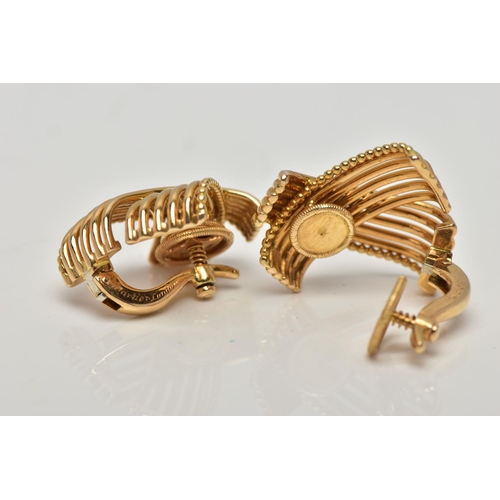 20 - A PAIR OF MID 20TH CENTURY CARTIER EARRINGS CIRCA 1960s, each ear clip designed as a wirework crosso... 