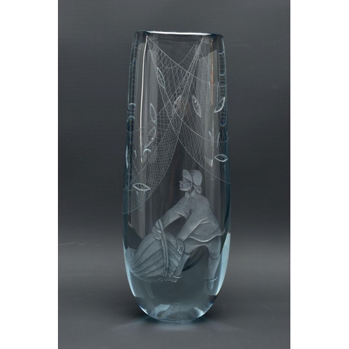 214 - A STROMBERGSHYTTAN WHEEL ENGRAVED VASE OF A FISHERMAN LANDING HIS CATCH, the vase design by Asta Str... 