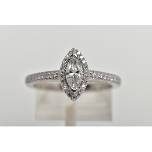 23 - A PLATINUM DIAMOND HALO RING, centring on a marquise cut diamond, estimated diamond weight 0.50cts, ... 