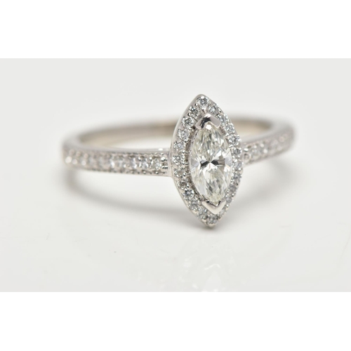 23 - A PLATINUM DIAMOND HALO RING, centring on a marquise cut diamond, estimated diamond weight 0.50cts, ... 