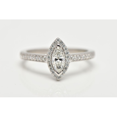 23 - A PLATINUM DIAMOND HALO RING, centring on a marquise cut diamond, estimated diamond weight 0.50cts, ... 