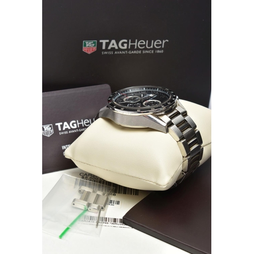 30 - A TAG HEUER 'CARRERA 1887' WRISTWATCH, the matt black dial with silver tone twelve hour Arabic numer... 