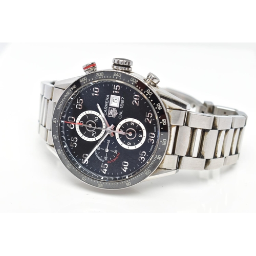 30 - A TAG HEUER 'CARRERA 1887' WRISTWATCH, the matt black dial with silver tone twelve hour Arabic numer... 