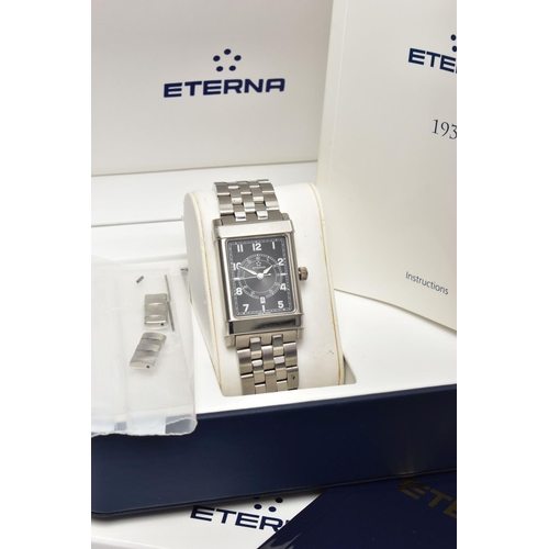 31 - AN ETERNA 'ETERNAMATIC' WRISTWATCH, the rectangular black dial with luminescent Arabic numerals, whi... 