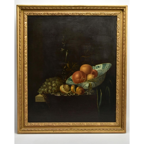 322 - A 20TH CENTURY STILL LIFE STUDY OF FRUIT AFTER WILLEM KALF, depicting oranges, lemons in a delft bow... 