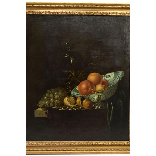 322 - A 20TH CENTURY STILL LIFE STUDY OF FRUIT AFTER WILLEM KALF, depicting oranges, lemons in a delft bow... 