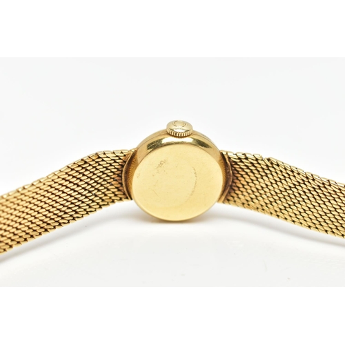 33 - AN 18CT GOLD OMEGA WRISTWATCH, hand wound movement, round gold dial signed 'Omega', baton markers, p... 