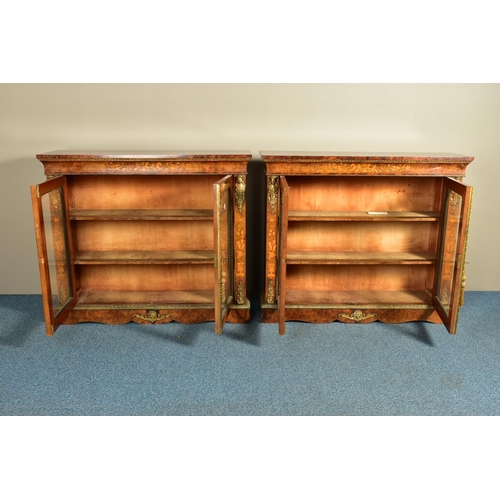 344 - A PAIR OF 19TH CENTURY FRENCH BURR WALNUT AND MARQUETRY INLAID BOOKCASES, the double glazed doors en... 