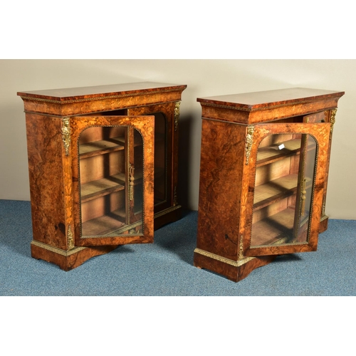 344 - A PAIR OF 19TH CENTURY FRENCH BURR WALNUT AND MARQUETRY INLAID BOOKCASES, the double glazed doors en... 