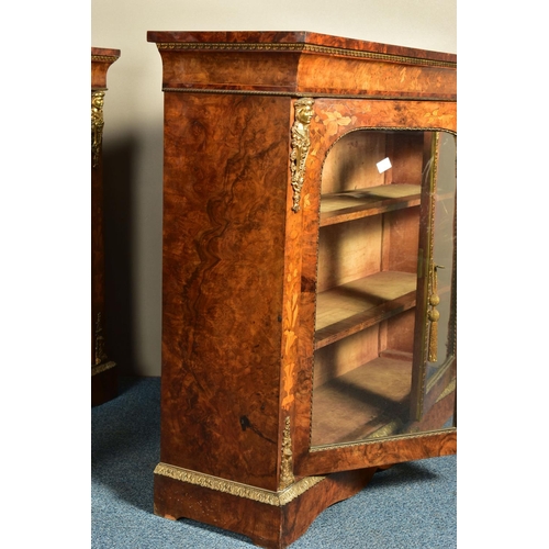 344 - A PAIR OF 19TH CENTURY FRENCH BURR WALNUT AND MARQUETRY INLAID BOOKCASES, the double glazed doors en... 