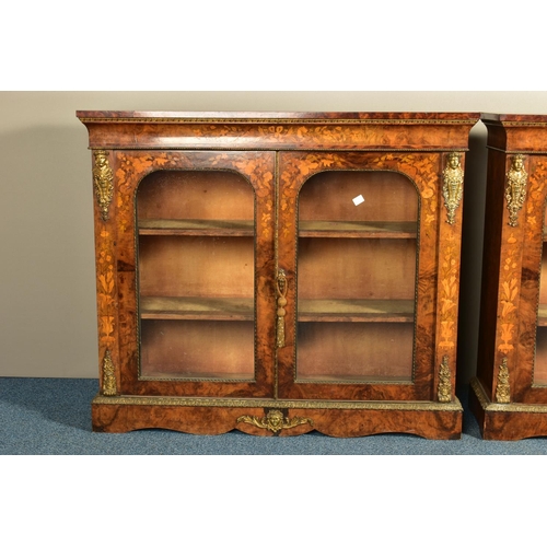 344 - A PAIR OF 19TH CENTURY FRENCH BURR WALNUT AND MARQUETRY INLAID BOOKCASES, the double glazed doors en... 