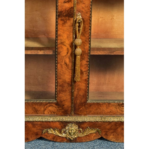 344 - A PAIR OF 19TH CENTURY FRENCH BURR WALNUT AND MARQUETRY INLAID BOOKCASES, the double glazed doors en... 