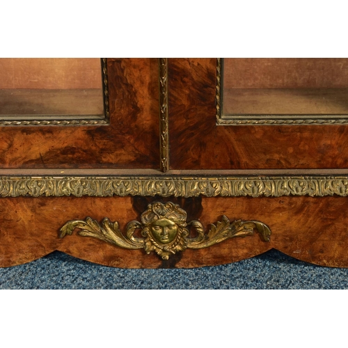 344 - A PAIR OF 19TH CENTURY FRENCH BURR WALNUT AND MARQUETRY INLAID BOOKCASES, the double glazed doors en... 