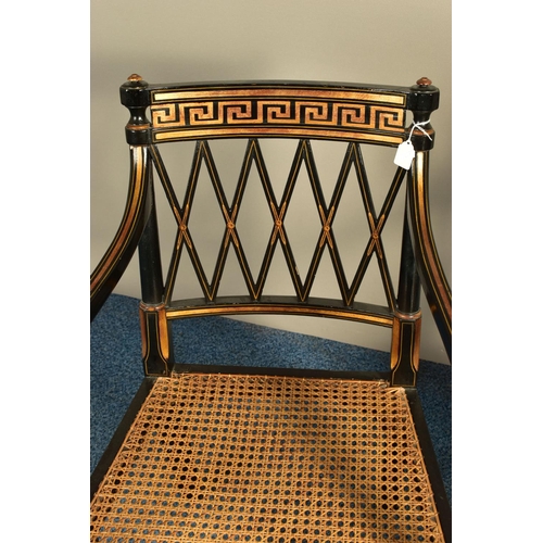 345 - A PAIR OF SHERATON REVIVAL EBONISED AND PARCEL-GILT ARMCHAIRS, c1820, with a Greek pattern to the to... 