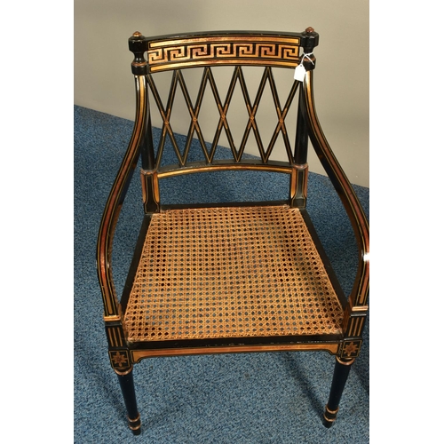 345 - A PAIR OF SHERATON REVIVAL EBONISED AND PARCEL-GILT ARMCHAIRS, c1820, with a Greek pattern to the to... 