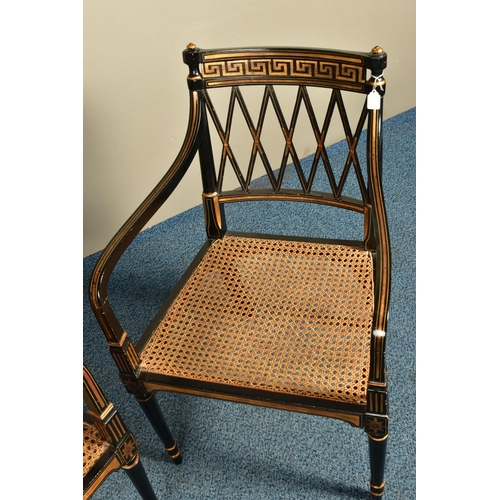 345 - A PAIR OF SHERATON REVIVAL EBONISED AND PARCEL-GILT ARMCHAIRS, c1820, with a Greek pattern to the to... 