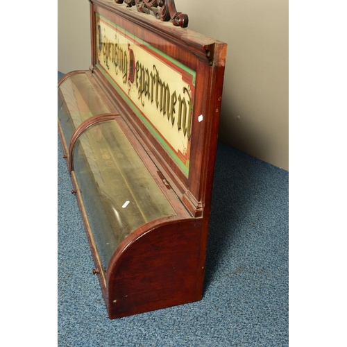 346 - A 19TH CENTURY MAHOGANY DISPENSING APOTHECARY CABINET, with an carved foliate surmount, coloured gla... 