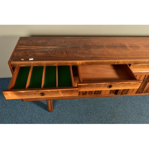 347 - ROBERT HERITAGE (BRITISH 1927-) FOR ARCHIE SHINE, A 1960'S ROSEWOOD SIDEBOARD, the four drawers with... 