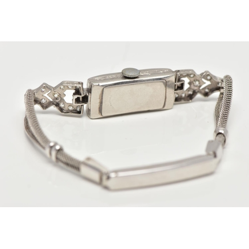 35 - AN EARLY TWENTIETH CENTURY DIAMOND COCKTAIL WATCH, a rectangular diamond case, measuring 23.0mm x 11... 