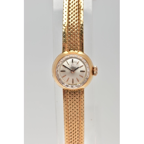 36 - A MID TWENTEITH CENTURY OMEGA LADIES GOLD WRISTWATCH, a small round case measuring 15.4mm in diamete... 