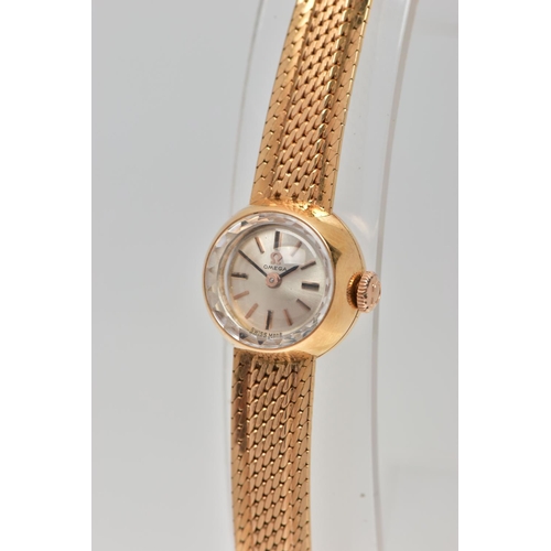 36 - A MID TWENTEITH CENTURY OMEGA LADIES GOLD WRISTWATCH, a small round case measuring 15.4mm in diamete... 