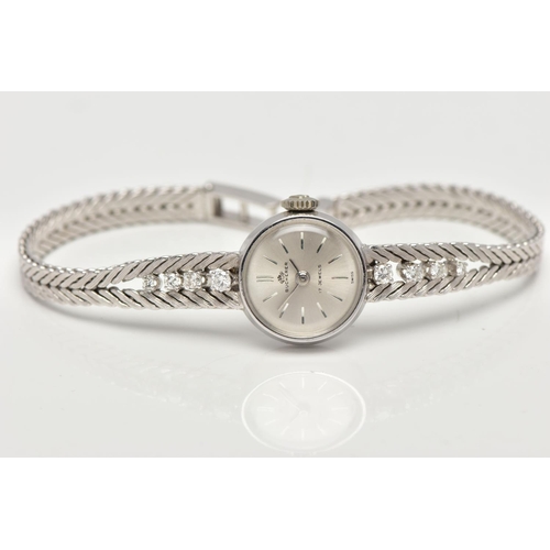 37 - A MID 20TH CENTURY DIAMOND WHITE METAL MANUAL WIND WRISTWATCH, the circular silver tone dial, with s... 