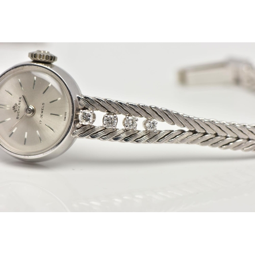 37 - A MID 20TH CENTURY DIAMOND WHITE METAL MANUAL WIND WRISTWATCH, the circular silver tone dial, with s... 