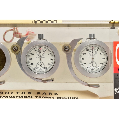 39 - MOTOR RACING INTEREST, to include two 'Nero Lemania' stopwatches encased in a triple watch hinged cu... 