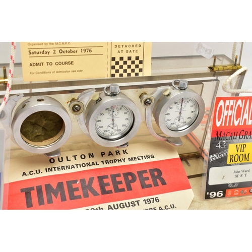 39 - MOTOR RACING INTEREST, to include two 'Nero Lemania' stopwatches encased in a triple watch hinged cu... 