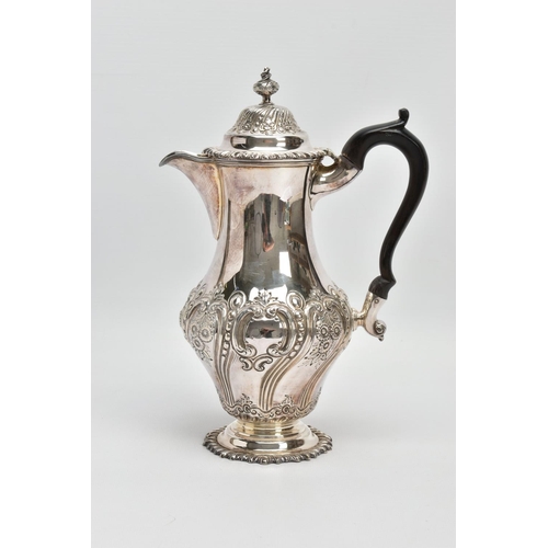 41 - A LATE VICTORIAN SILVER HOT WATER JUG OF BALUSTER FORM, the hinged domed cover with knopped finial, ... 