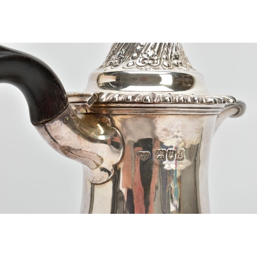 41 - A LATE VICTORIAN SILVER HOT WATER JUG OF BALUSTER FORM, the hinged domed cover with knopped finial, ... 